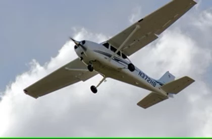 Ash Scattering Airplane In the Clouds